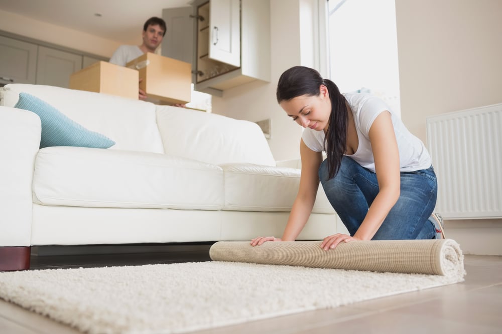 How Should Rugs Go Under The Couch?